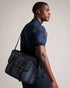 TRAVYL-Bags-It's All In The Details:the Fabric Of This Product Is Made Of 100% Recycled Polyester. Using Recycled Polyester Helps Divert Plastic Waste From Ending In Landfills And Helps Us To Reduce Our Dependence On Virgin Materials. Nylon document bag Top handle Buckle fastening Adjustable shoulder strap Name tag Zip fastening Dimensions: 8cm x 30cm x 39cm- Ted Baker Romania
